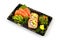 Salmon Sashimi and California Maki fill with Pigeon pea and spicy Seaweed salad Japanese tradition food in delivery low cost box