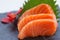 Salmon Sashimi : Sliced Raw Salmon Served with Sliced Radish on Stone Plate