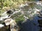 Salmon in Stream during Salmon run in Alaska. Fish returning to their place of birth from saltwater to fresh water to spawn and di