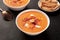 Salmorejo, Spanish cold tomato soup, on a black background