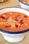 Salmorejo, Spanish cold tomato soup in a rustic bowl, a close-up