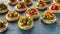 Salsa canape cracker appetizers with soft cheese