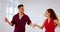 Salsa, dance partners and happy couple dancing with a smile and fun in a dancer studio. Tango, exercise and happiness of