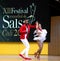 Salsa dancers in Internacional Festival of Salsa in Cali, Colombia red couple