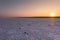 Salt desert sunset view with nice colored sunset background