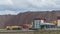 Salt dump. Wagons with potash fertilizers are being prepared for shipment. Freight car behind barbed wire. Sanctions.