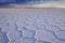 Salt flat Salar de Uyuni in Bolivia at sunrise