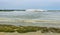 Salt flats pand salt piles Salin-de-Giraud and Piemanson beach in French Carmargue