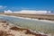 Salt lake with salt hills on island Bonaire