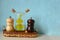 Salt mill pepper grinder and oil bottle with two compartments. Kitchen utensils accessories and spices. Recipes and cuisine