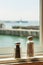Salt and papper shaker s at ocean view restaurant window