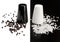 Salt and pepper shakers, black pepper and salt crystals