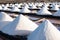 Salt piles on a saline exploration in salt factory refinery mines Janubio, Lanzarote, Canary Islands, Spain