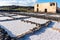 Salt piles on a saline exploration in salt factory refinery mines Janubio, Lanzarote, Canary Islands, Spain