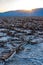 Salt plateau of self-sedimented salt cracked in the heat of the sun in the desert in Death Valley, Death Valley National