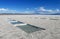 Salt pools on Salar Uyuni salt lake, salt production