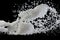 Salt powder pour fall in bowl, white Salt crystal cook abstract cloud fly. Ground salt splash in air, food object element design.