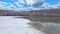 Salt production. Salt piles among the green fields. Salt lake mining of potassium salts.