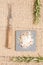 Salt with spices on dark plate with rosemary and antique fork