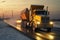 salt spreader truck on a freezing highway