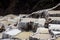 The salt terraces of Maras Cusco the snowcapped Salkantay Andes mountain peak in the background, Sacred Valley of the Inca,