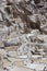 The salt terraces of Maras Cusco the snowcapped Salkantay Andes mountain peak in the background, Sacred Valley of the Inca,