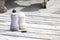 Salt and vinegar bottles on wooden table