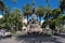 Salta\'s central plaza statue with palm trees, Argentina