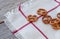 Salted bretzels on a linen napkin. Selective focus.