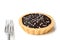 Salted chocolate tart on white background