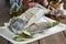 Salted cod cut on the table of the kitchen