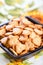 Salted crackers in black bowl