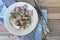 Salted herring on white rustic plate. Russian food, top view