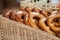 Salted pretzels  in wooden basket at the market in the street