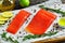 Salted salmon fish fillet with fresh rosemary