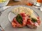 Saltimbocca with Risotto on plate. table setting, restaurant