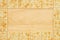 Saltine crackers border with wood background