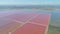 The saltpan Saline stretches Margherita di Savoia Apulia City Sea Coastline sed water in Italy Drone flight