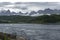 Saltstraumen tidal current in Norway with mountains in background