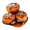 Salty Caramel candies with caramel sauce isolated on a white background close up