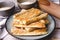 Salty sesame bread sticks traditional homemade baked snacks on the table - close up healthy vegan or vegetarian food concept