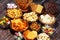 Salty snacks. Pretzels, chips, crackers in wooden bowls on table