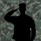 Saluting soldier\'s silhouette on green army camouflage background