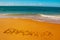 SALVADOR, BAHIA, BRAZIL: Inscription on the sand city of Salvador, drawing on the beach