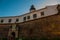 SALVADOR, BRAZIL: Entrance gate. Colorful sign stands in front of the colonial Farol da Barra lighthouse, the oldest in South