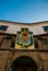 SALVADOR, BRAZIL: Entrance gate. Colorful sign stands in front of the colonial Farol da Barra lighthouse, the oldest in South