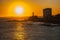 SALVADOR, BRAZIL: Portrait of the Farol da Barra Salvador Brazil lighthouse. Beautiful landscape with verm at sunset