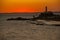 SALVADOR, BRAZIL: Portrait of the Farol da Barra Salvador Brazil lighthouse. Beautiful landscape with verm at sunset