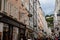 Salzburg, Austria, 28 August 2021: Grain Lane or Getreidegasse famous shopping narrow street in historic Altstadt or Old Town,