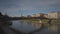 Salzburg, Austria. Cityscape over river in Salzburg on sunny winter day. Salzach riverfront. Embankment of Salzach river